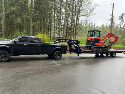 Excavator & 25’ 14,000# hydraulic tilt trailer