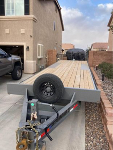8’ x 26’ Deckover Trailer w/Hideaway Ramps. 24,000GW trailer weighs 4,470lbs. Has 2” Pintle Hitch. Ramps are rated at 10,000lbs.