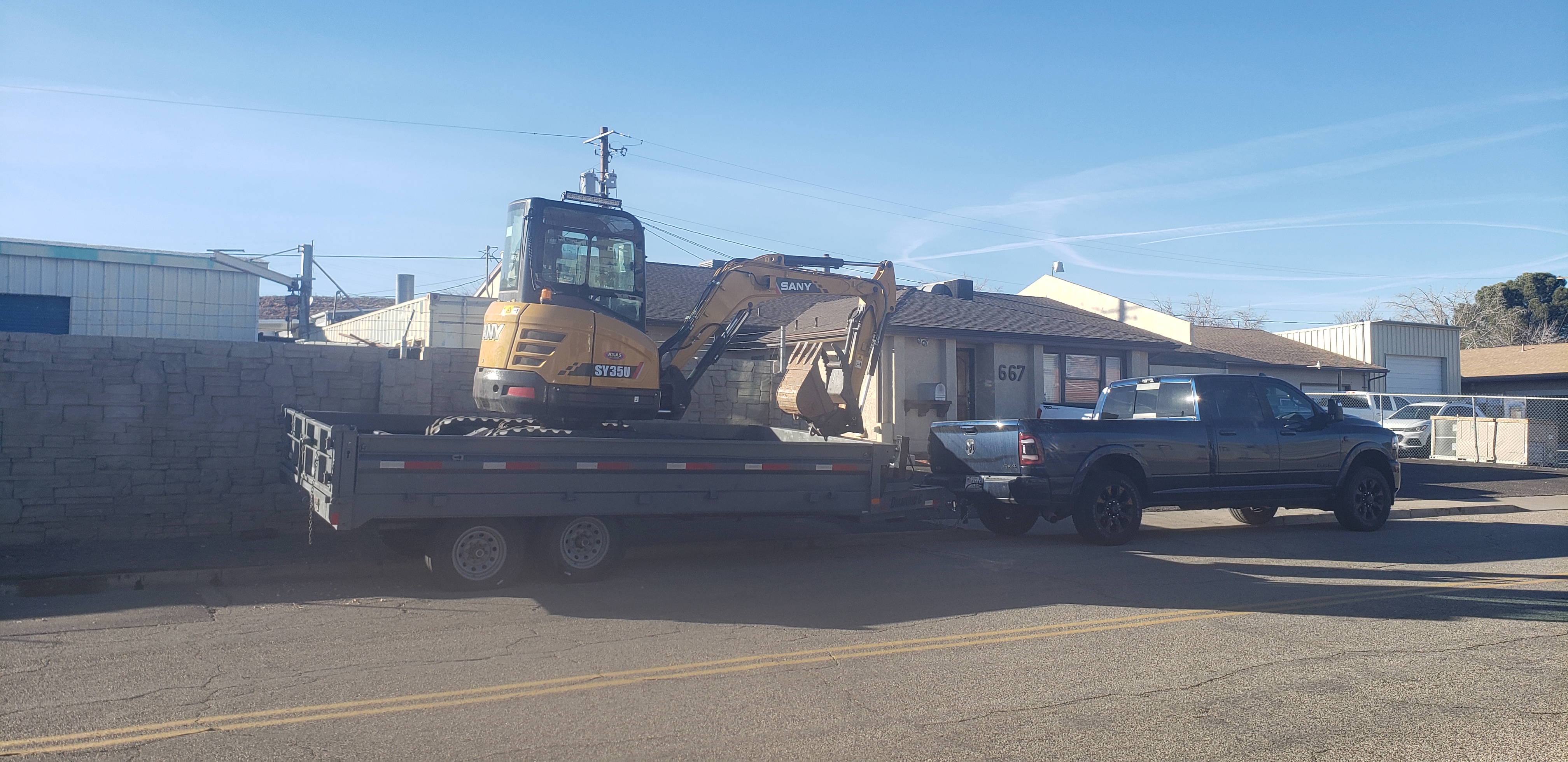 mini ex / dump trailer combo