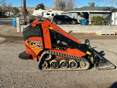Mini track skid steer