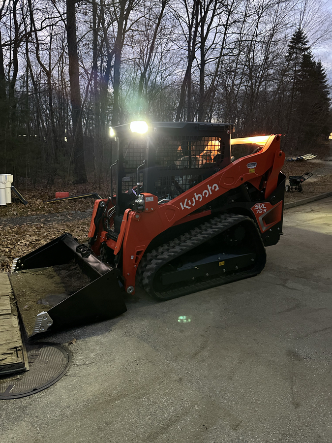 Full size tracked skid steer