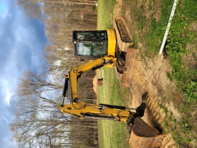 Excavator with bucket or power hammer