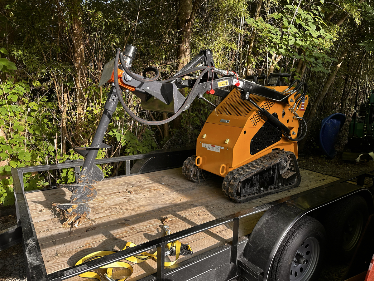 Stand on Skidsteer Auger