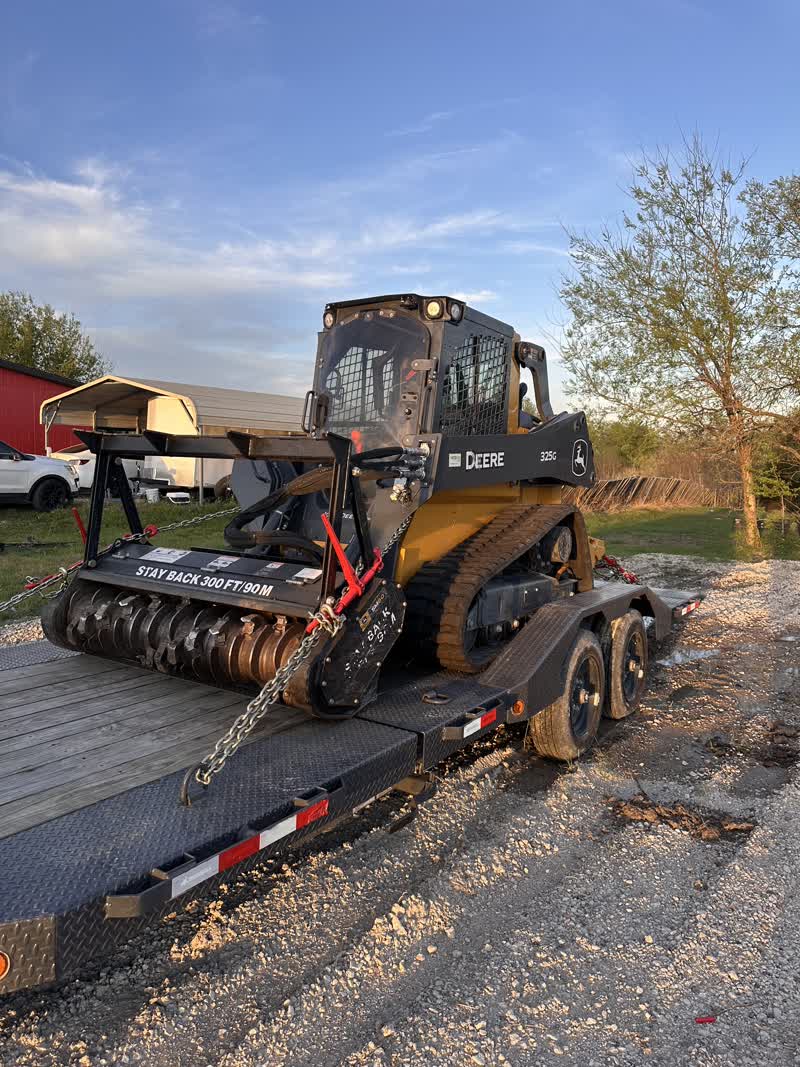 Skid steer with mulcher