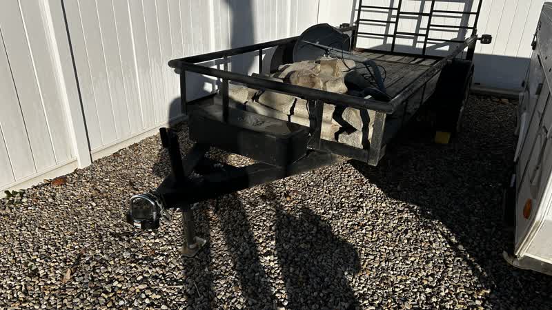 18’ flat bed trailer that tilts. And has drop gate